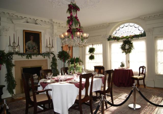 Dining room at Theodore Roosevelt Inaugural National Monument, decorated with the help of the Smallwood Garden Club, 2014.  Chandelier decorations installed by site curator.  (Image courtesy of Theodore Roosevelt Inaugural National Historic Site.)